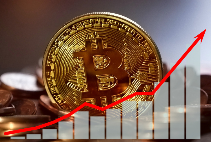 Bitcoin coin with upward chart