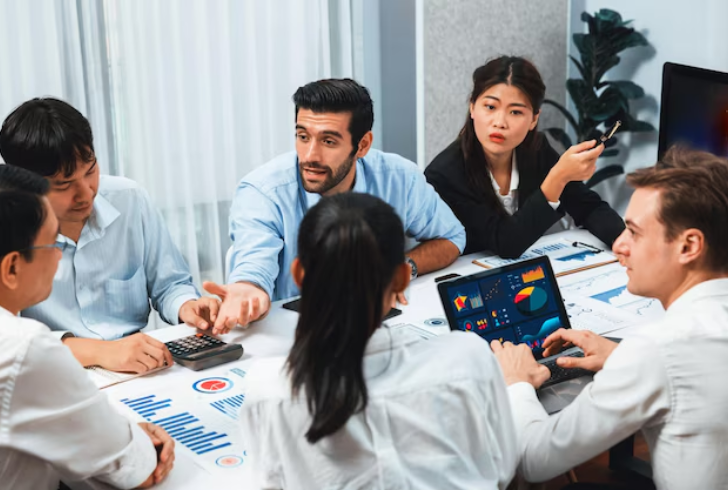 Team discussing financial strategy and governance