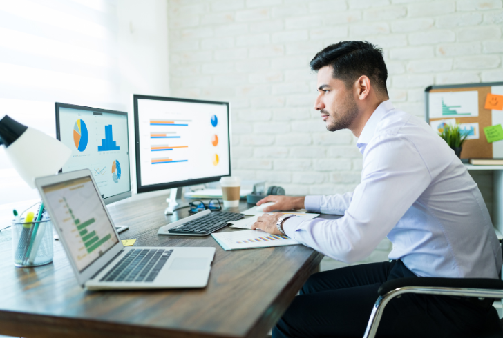 Advisor analyzing fund performance charts