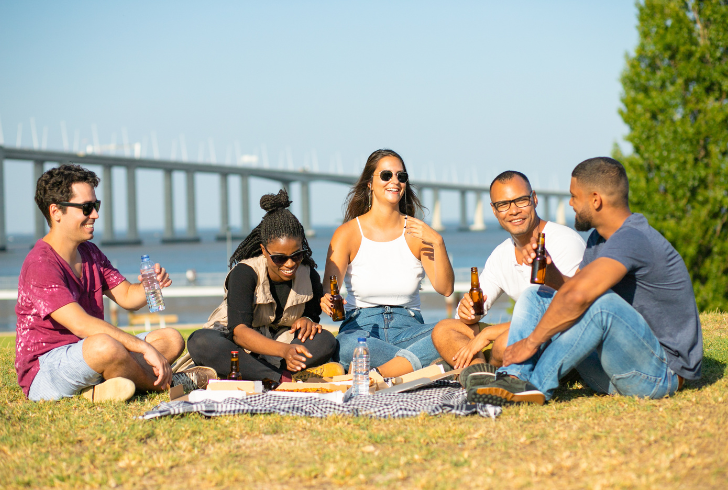 Happy people enjoying time together outdoors